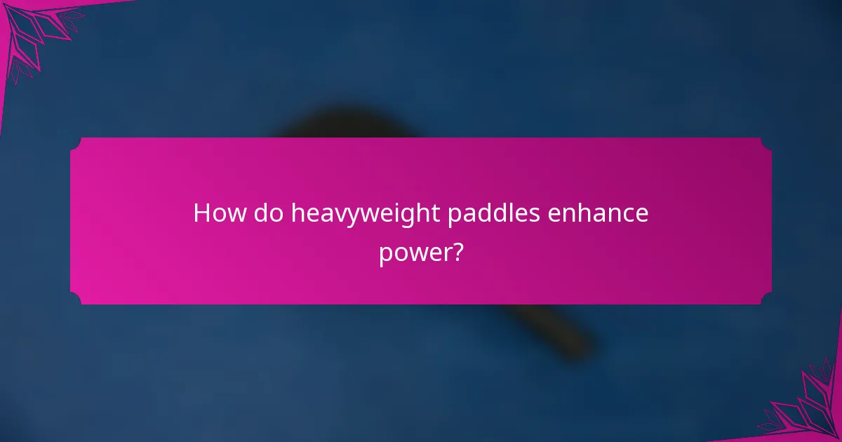 How do heavyweight paddles enhance power?
