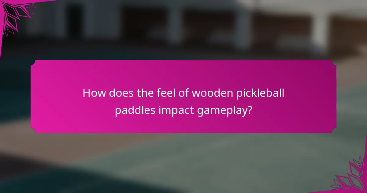 How does the feel of wooden pickleball paddles impact gameplay?