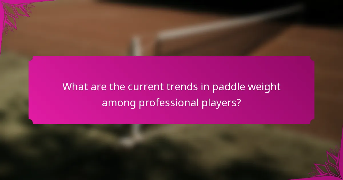 What are the current trends in paddle weight among professional players?